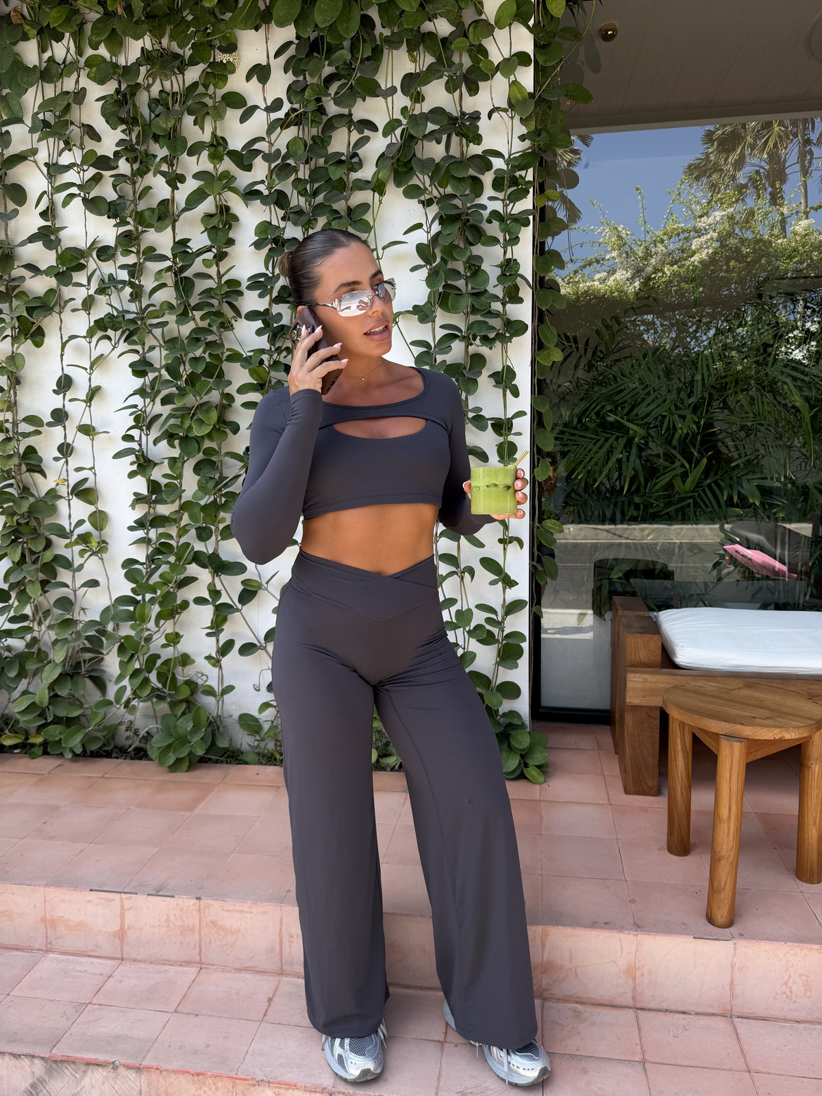 Lumi Trousers in Charcoal, full-length front view worn with trainers.